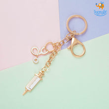 Load image into Gallery viewer, Doctor Essentials Metallic Keychain
